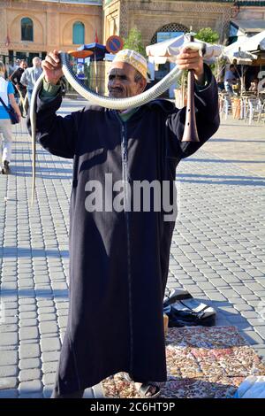 Meknes, Morocco- November 19th 2014: Unidentified snake charmer on a square in the souks of the city Stock Photo