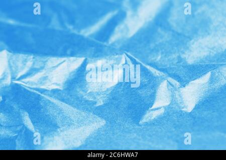 Crumpled blue color paper abstract texture background Stock Photo