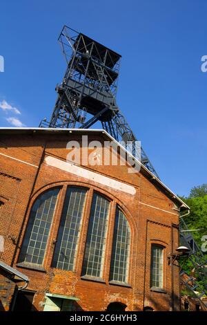 Black coal mine, Landek, Ostrava, Czech Republic / Czechia, Central Europe - tower with wheel and elevator. Detail of historical industrial architectu Stock Photo
