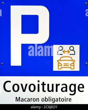 Traffic sign in French for car park for carpooling (covoiturage = car-sharing), Le Brassus, Vallée de Joux, Vaud, Switzerlandd Stock Photo