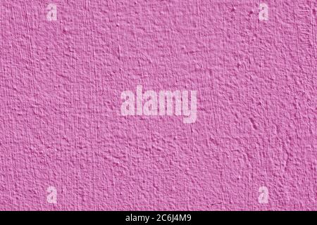 Pink stucco texture. Designer interior background. Abstract architectural surface. Stock Photo