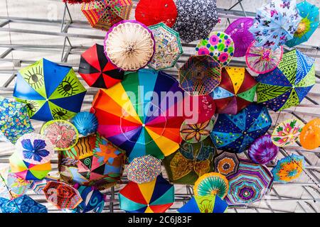 fun décor: ceiling covered with many colors and patterns of umbrellas Stock Photo