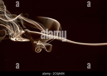 Smoke isolated on dark background Stock Photo