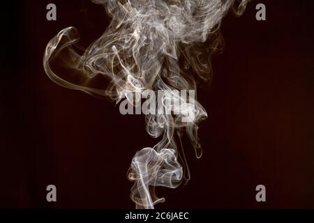 Smoke isolated on dark background Stock Photo