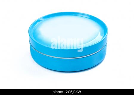 Shiny metal packaging isolated on white background. Blank, sky blue box Stock Photo