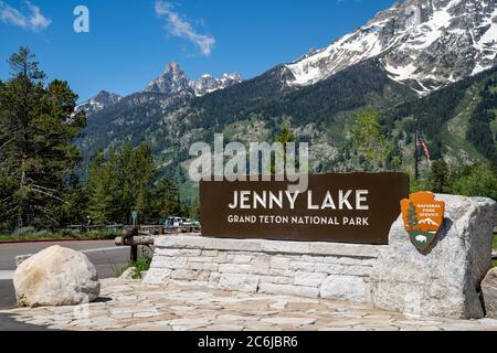 Grand Teton National Park, Wyoming - June 26, 2020: Sign for Jenny Lake, a famous scenic lake with a visitors center inside the National Park Stock Photo