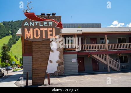 Jackson, Wyoming - June 26, 2020: Sign for the Antler Motel, located in downtown Jackson Hole. Retro, midcentury style neon sign Stock Photo