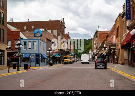 Deadwood, South Dakota - June 22, 2020: Main street in downtown Deadwood, a tourist town featuring gunslinging cowboys, casinos and shopping Stock Photo