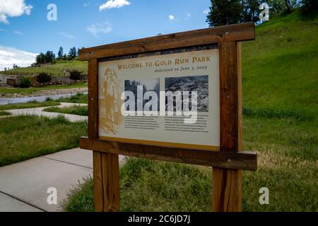 Lead, South Dakota - June 22, 2020: Sign for Gold Run Park, a mining area of the Homestake Mine in the Black Hills of SD