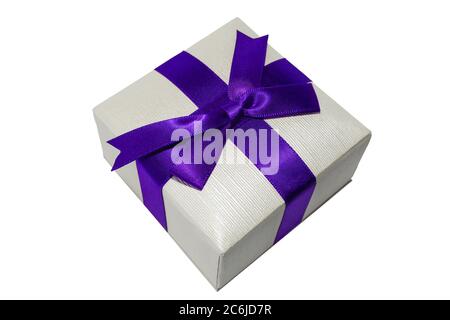 Small gift box with blue ribbon isolated on white background. Jewelry/holiday box close up Stock Photo