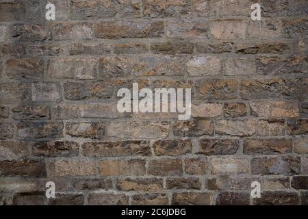 Antique brickwork wall. Masonry of ancient half-destroyed wall. Abstract texture or background Stock Photo