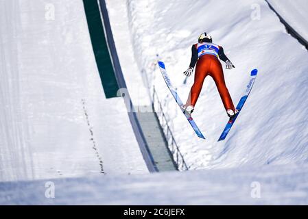 Ski jumper jumps from the large hill at the Nordic World Championships, Seefeld, Austria, 2019. Stock Photo