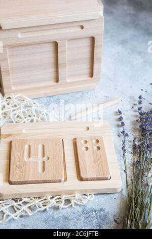 Wooden counting and writing trays - learning resource for educating littles on number writing, fine motor skills, hand eye coordination, mathematical Stock Photo