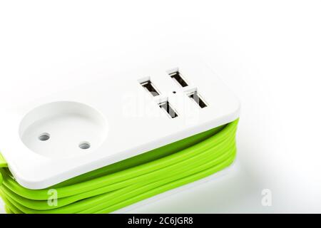 USB Power Strip Green power cord for charging gadgets and electronic devices. Stock Photo