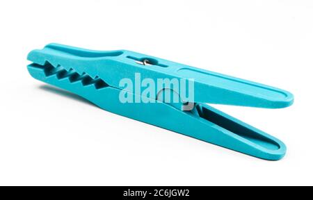 Blue clothespin isolated on white. Used clothes clamp close up Stock Photo
