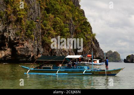 A bangka, the traditional filipino boat, in the Bacuit archipelago. El Nido. Palawan. Philippines Stock Photo