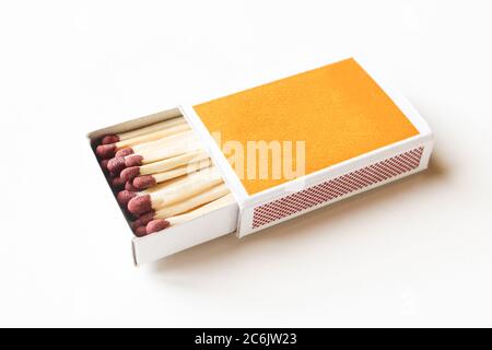 Box of matches isolated on white background. Top view of opened box full of matchsticks Stock Photo