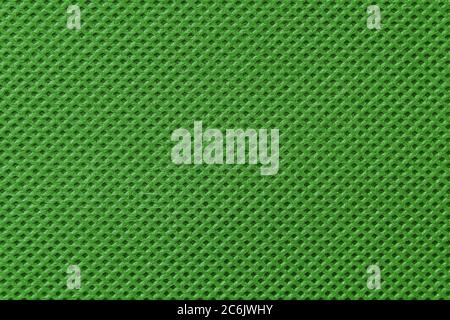 Green fabric textile close up pattern background Stock Photo