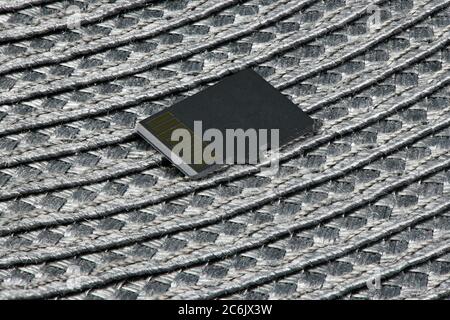 SD memory card on grey tissue background. High resolution photo. Full depth of field. Stock Photo