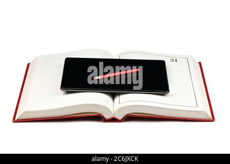 Tablet pc on opened book isolated on white background. High resolution photo. Full depth of field. Stock Photo