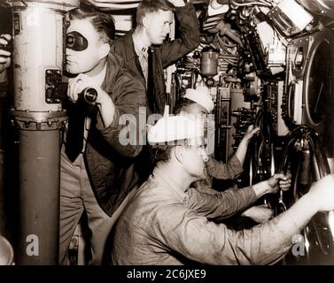 Lt. Jimmy Carter at his duty station aboard a US Navy submarine just after World War Two. President James Earl (Jimmy) Carter, Jr., who in 1976 became the fifth consecutive President with prior Navy service, from Plains, Georgia born to Lillian Gordy and James Earle Carter. Carter grew up in a rural atmosphere and attended public schools. Graduating from Plains High School in 1941, he attended Georgia Southwestern College in Americus, Georgia. After a year there, Carter transferred to Georgia Institute of Technology to study mathematics for a year in order to qualify for the U.S. Naval Academy Stock Photo