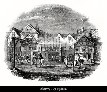An old engraving showing 'The Tabard' (or 'The Talbot') during the middle ages. This historic inn stood on the east side of Borough High Street, Southwark, London, England, UK. It was established in 1307 and stood on the route south from London Bridge to Canterbury and Dover. The Tabard was famous for accommodating people who made the pilgrimage to the Shrine of Thomas Becket in Canterbury Cathedral, and Geoffrey Chaucer mentions it in his 'The Canterbury Tales'. In these times, The Tabard would have been filled with a mixture of pilgrims, drunks, travellers, criminals and prostitutes. Stock Photo