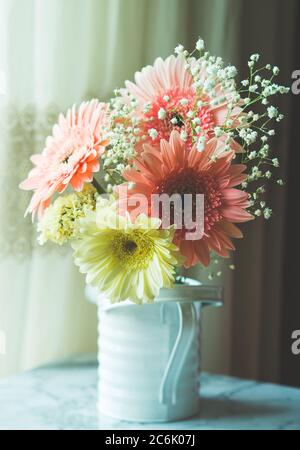 Yellow and pink gerbera daisy flowers bouquet Stock Photo