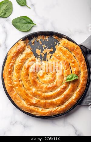 Filo Spinach and Feta Twist Pie Stock Photo - Alamy