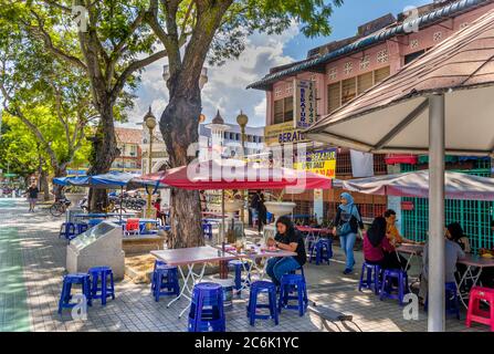 Sidewalk cafe on Jalan Masjid Kapitan Keling in the old Colonial district, George Town, Penang, Malaysia Stock Photo