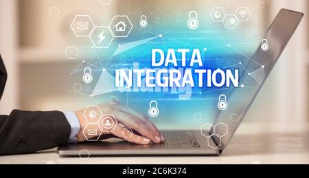 DATA INTEGRATION inscription on laptop, internet security and data protection concept, blockchain and cybersecurity Stock Photo