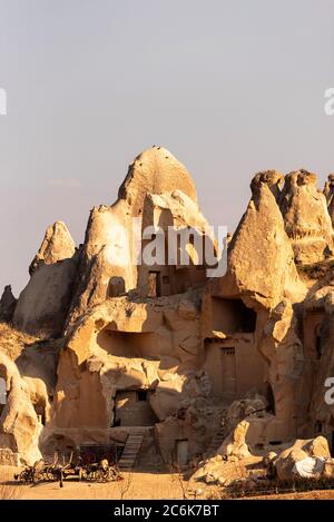 Houses built on the rocks of the Goreme Valley. Cappadocia, Turkey. Stock Photo