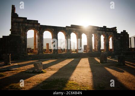 Ancient Roman ruins at an archaeological site, Volubilis, Morocco Stock Photo