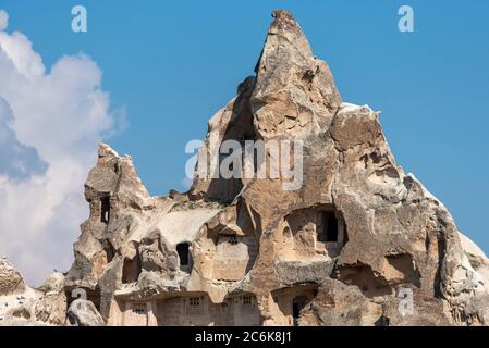 Houses built on the rocks of the Goreme Valley. Cappadocia, Turkey. Stock Photo