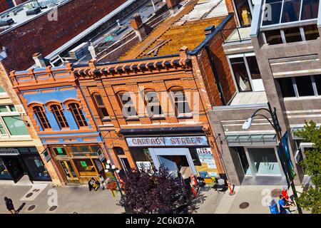 A view of heritage buildings on lower Yates Street in Victoria, British Columbia, Canada Stock Photo
