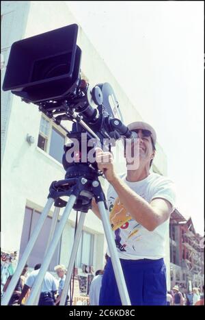 Ray Manzarek of The Doors filming video for L.A. Woman in Venice Beach, CA circa 1984 Stock Photo