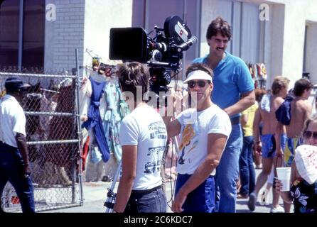 Ray Manzarek of the Doors and crew filming video ofr the song L.A. Woman on the boardwalk in Venice, CA Stock Photo