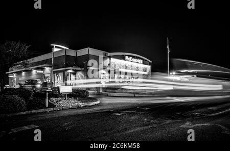 McDonald's Restaurant in Coos Bay, Oregon at night, black and white Stock Photo