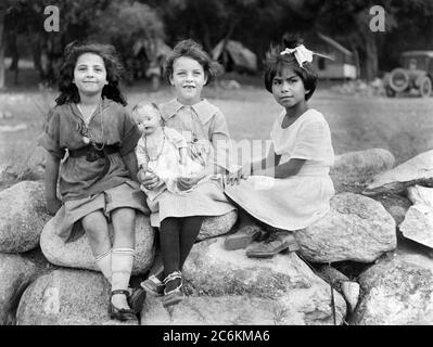 Portrait of Three Young Girls, one holding a Doll, Kiddie Camp funded and maintained by American Red Cross, Santa Margarita Canyon, San Luis Obispo County, California, USA, American Red Cross Collection, September 1920 Stock Photo