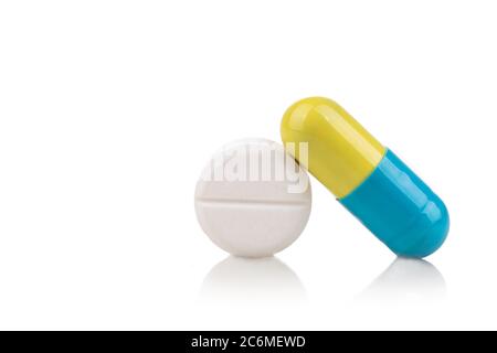 Close-up on medicine drug in capsule and tablet format on white background Stock Photo