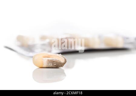 Strip of expired soft gel caplet medicine with mold  on white background Stock Photo