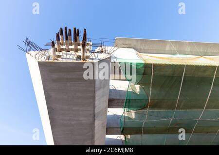 Close-up of concerete beam joints metal bar in highway overlay bridge construction Stock Photo
