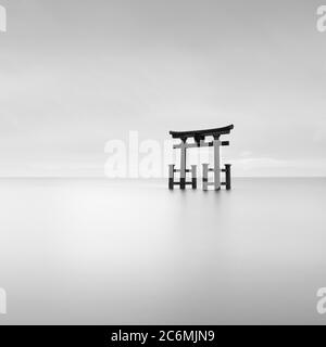 Long exposure shot of Shirahige shrine Torii gate at sunrise, Lake Biwa, Shiga Prefecture, Japan Stock Photo