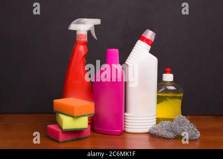 Set for cleaning various surfaces in the kitchen, bathroom and other areas. Concept of home cleaning services. Stock Photo