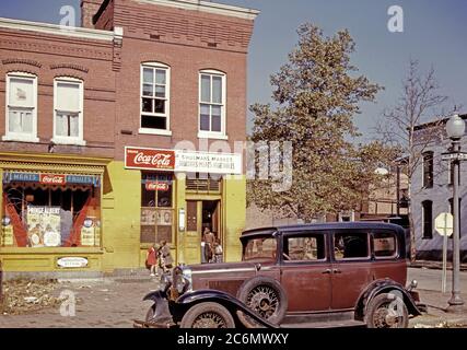hulman's Market at the southeast corner of N Street and Union Street S.W., Washington, D.C., with a 1931 Chevrolet car parked in front  ca 1941-1942 Stock Photo