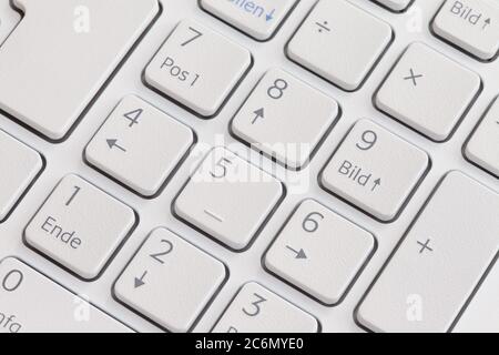 German Language Computer Keyboard - White Numpad - DE, GER Stock Photo