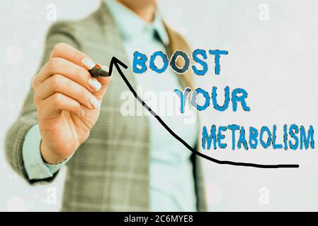 Writing note showing Boost Your Metabolism. Business concept for body process uses to make and burn energy from food Digital arrowhead curve denoting Stock Photo