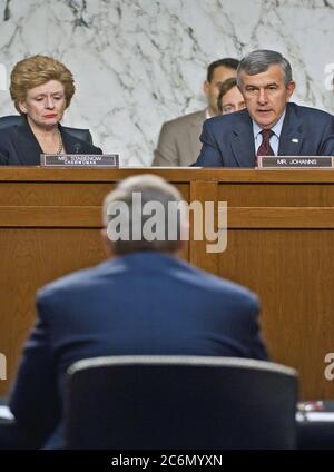Senator Debbie Stabenow, MI, Chairwoman of the U.S. Senate Committee on Agriculture, Nutrition and Forestry and Senator and former Agriculture Secretary Mike Johanns, NE, question Agriculture Secretary Tom Vilsack during a hearing on the next Farm Bill in Washington, DC, Thur., May 26, 2011. Stock Photo
