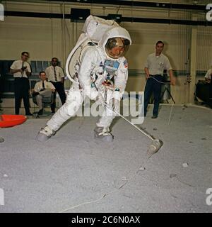 Suited astronaut Neil A. Armstrong, wearing an Extravehicular Mobility Unit (EMU), participates in lunar surface simulation training on April 18, 1969 Stock Photo