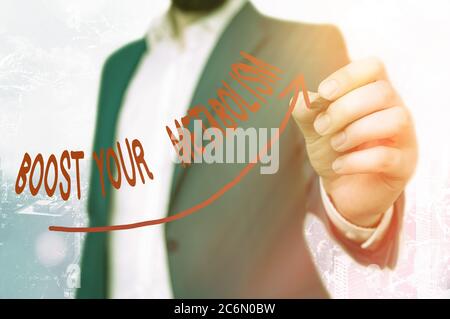 Writing note showing Boost Your Metabolism. Business concept for body process uses to make and burn energy from food Digital arrowhead curve denoting Stock Photo