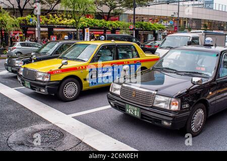 Tokyo / Japan - October 20, 2017: Taxi cars on the road in central Tokyo, Japan Stock Photo